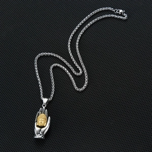 Retro Thai silver Buddha palm necklace with gold frosted pendant in 45-degree view