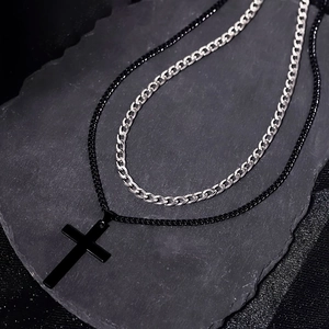 Double-layered stainless steel necklace featuring a black cross pendant and silver Cuban chain