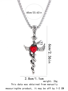 Detailed view of gothic sword pendant with red heart gemstone and silver wings with dimensions