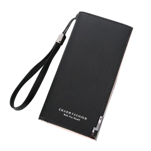 Black long pebbled leather wallet with wristlet and silver hardware on white background