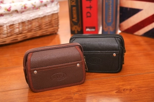 Detail of dual zipper men belt pouch in black and dark coffee lychee pattern faux leather
