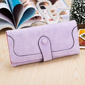 Detailed side view of long lavender frosted matte wallet on a wooden surface with decor