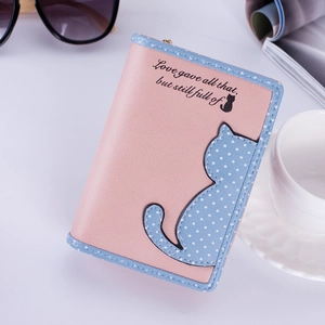 Close-up of pink cute cat pattern purse with contrast stitching and metal zipper