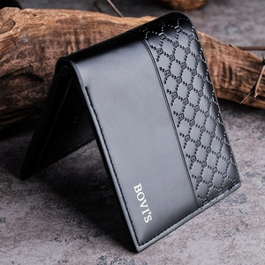 Men's bifold black leather wallet with diamond pattern and BOVI'S logo on stone surface