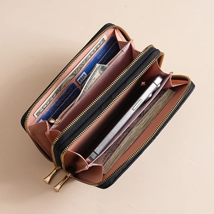 Detailed internal view of double-zipper wallet showing card slots and phone pocket