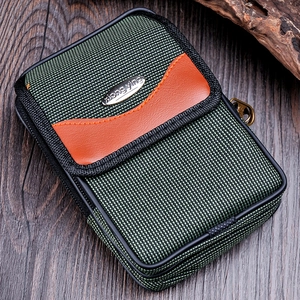 Detail view of Oxford cloth belt pouch featuring green nylon grid and brown leather flap