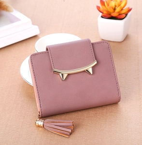 Short faux leather wallet for women with golden cat ear buckle and tassel charm