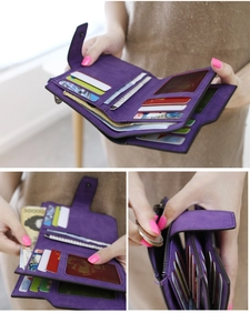 Detail view of purple matte wallet interior with multiple card slots and zip coin pocket