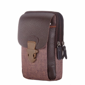 Detail view of brown PU leather and canvas waist bag with dual zippers and buckle