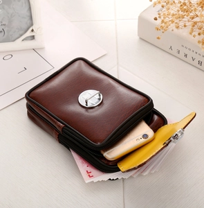 Close-up of retro brown PU leather dual-layer phone waist bag showing banknote storage