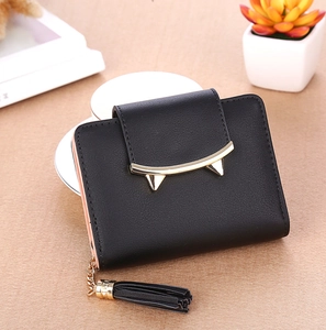 Short black faux leather wallet featuring a cat ear metal clasp and fringe zipper tassel