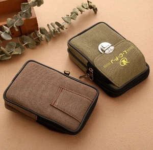 Waterproof canvas men's waist bag with dual zippers and durable metal buckle