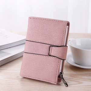 Pink matte tri-fold short wallet with litchi texture and metal zipper detail