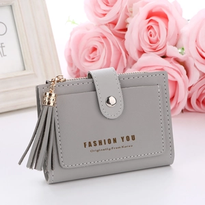 Grey bifold short wallet for women with tassel zipper and letter buckle detail