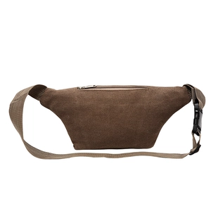 Detailed view of heavy-duty dark brown canvas waist bag with zipper and quick release buckle