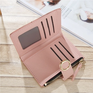 Interior detail of pink PU leather wallet with card slots, ID window and zipper pocket
