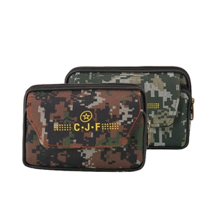 Detail of camouflage tactical belt pouches in jungle and digital patterns with velcro flip cover