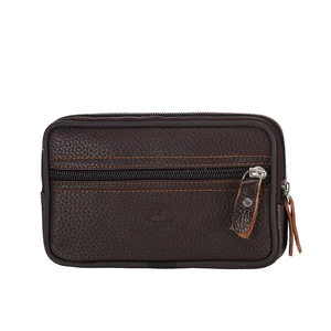 Detail of dark brown pebbled leather waist bag with orange stitching and multi-zip design