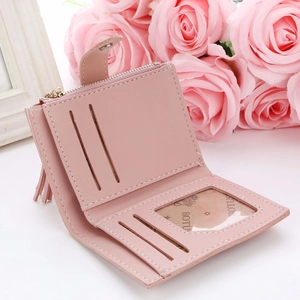 Detail of pink PU leather wallet showing card slots, ID window and tassel charm