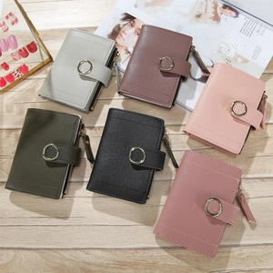 Collection of colorful short PU leather wallets for women with round metal buckles