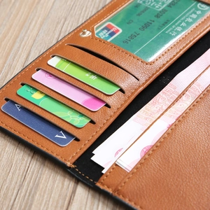 Detail view of the brown long wallet showing multiple card slots and internal layout