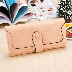 Elegant apricot long wallet with frosted texture and minimalist patchwork design