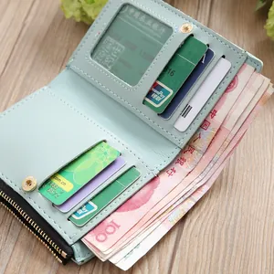 Internal layout of mint green PU leather wallet showing card slots and ID window
