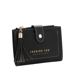 Short black pebble leather wallet with button flap, tassel detail and white stitching