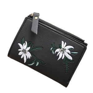Mini black leather short wallet for women featuring delicate daisy flower embroidery