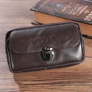 Dark brown leather belt pouch with metal lock and zipper on rustic wooden background