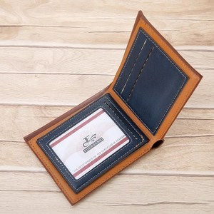 Mens slim bifold leather wallet featuring brown exterior and blue interior with card slots