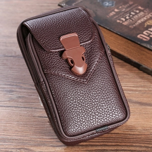 Detail of dark brown leather phone holster with double zippers and buckle on wood surface