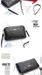 Detail of black shell bag with geometric diamond quilting and gold zip compartments