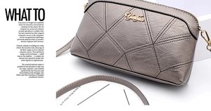 Detail of the silver geometric quilted bag with a gold YueJin logo and shoulder strap