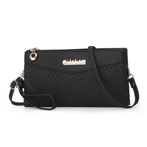 Women's black V-quilted small crossbody bag with gold hardware and logo on white background