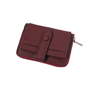 Detailed view of dark burgundy vintage mini wallet with metal zipper and snap pocket