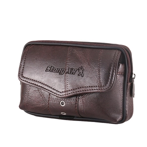 Detail shot of the dark brown leather waist bag featuring a textured finish and logo