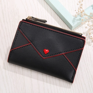 Short PU leather heart wallet for women featuring a red envelope flap and gold zipper detail