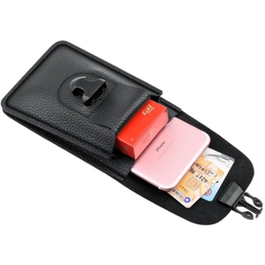 Detail view of leather belt pouch with multiple compartments for phone and cards