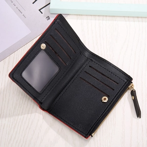 Detail view of bi-fold PU leather wallet with 6 card slots and golden zipper pocket