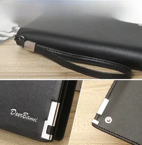 Detail of black leather men's long wallet featuring wrist strap and metallic brand logo