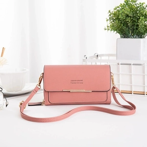 Pink minimalist crossbody bag with gold metal trim and Forever Sunshine print