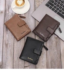 Short leather wallets for men in black and brown, displayed with a laptop and coffee