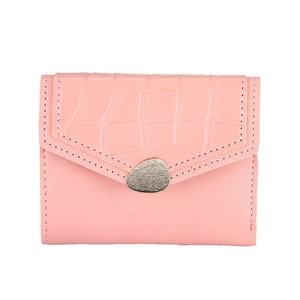 Detail of pink faux crocodile skin texture and envelope flap with gold metal buckle