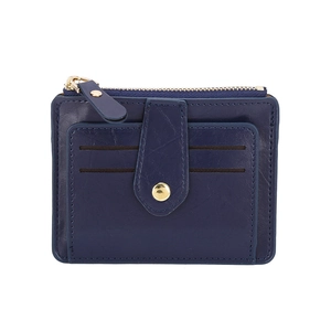 Close-up of slim dark blue wallet featuring litchi texture leather and gold snap button