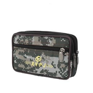 Detail view of camouflage canvas belt pouch with three separate zipper compartments