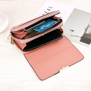 Internal view of pink multi-functional phone bag with card slots and double zippers