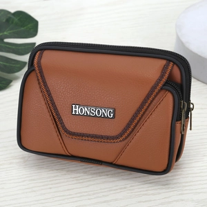 Brown leather men's belt waist bag with dual zippers and Honsong metal logo on wood surface