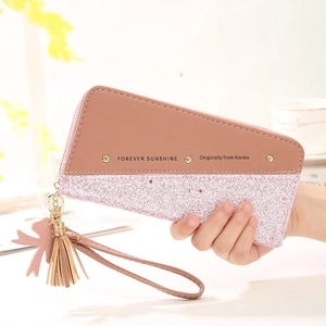 Lange Geldbörse in Pink-Glitzer und Braun mit Quasten und Schleifen-Anhänger