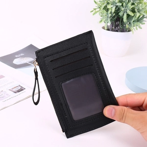 Slim black faux leather card holder with three card slots and a clear ID window